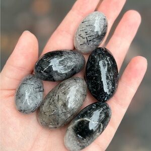 Black tourmaline in Quartz tumbles